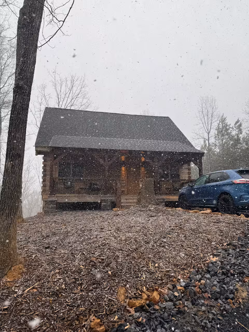 Cabin dusted in winter snow